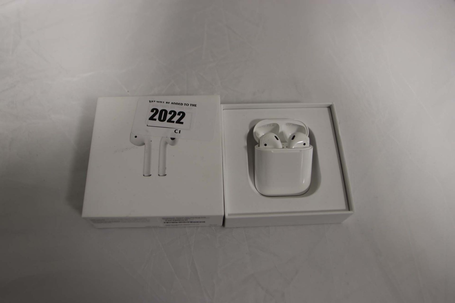 Pair of Apple AirPods in case