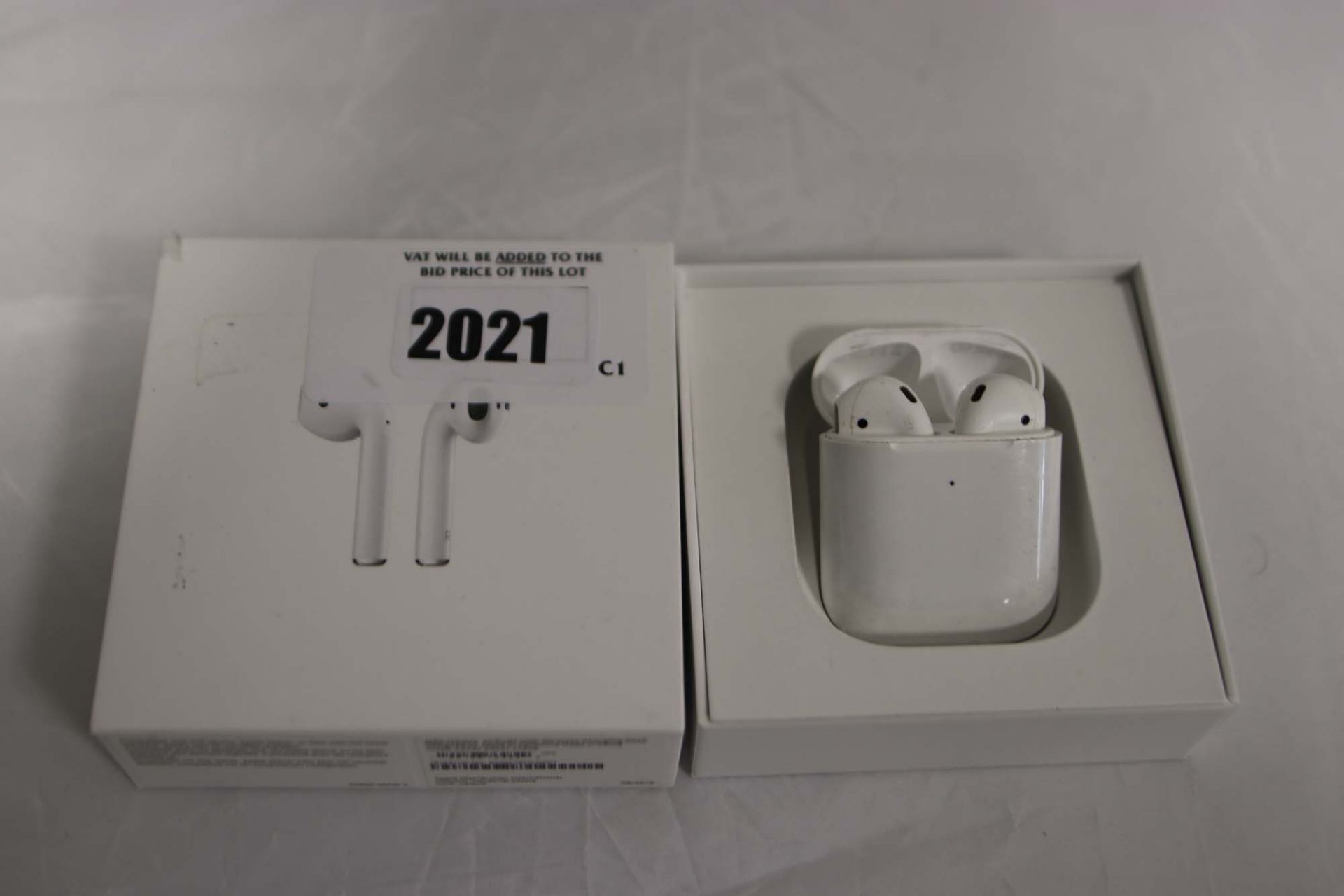 Pair of Apple AirPods in case