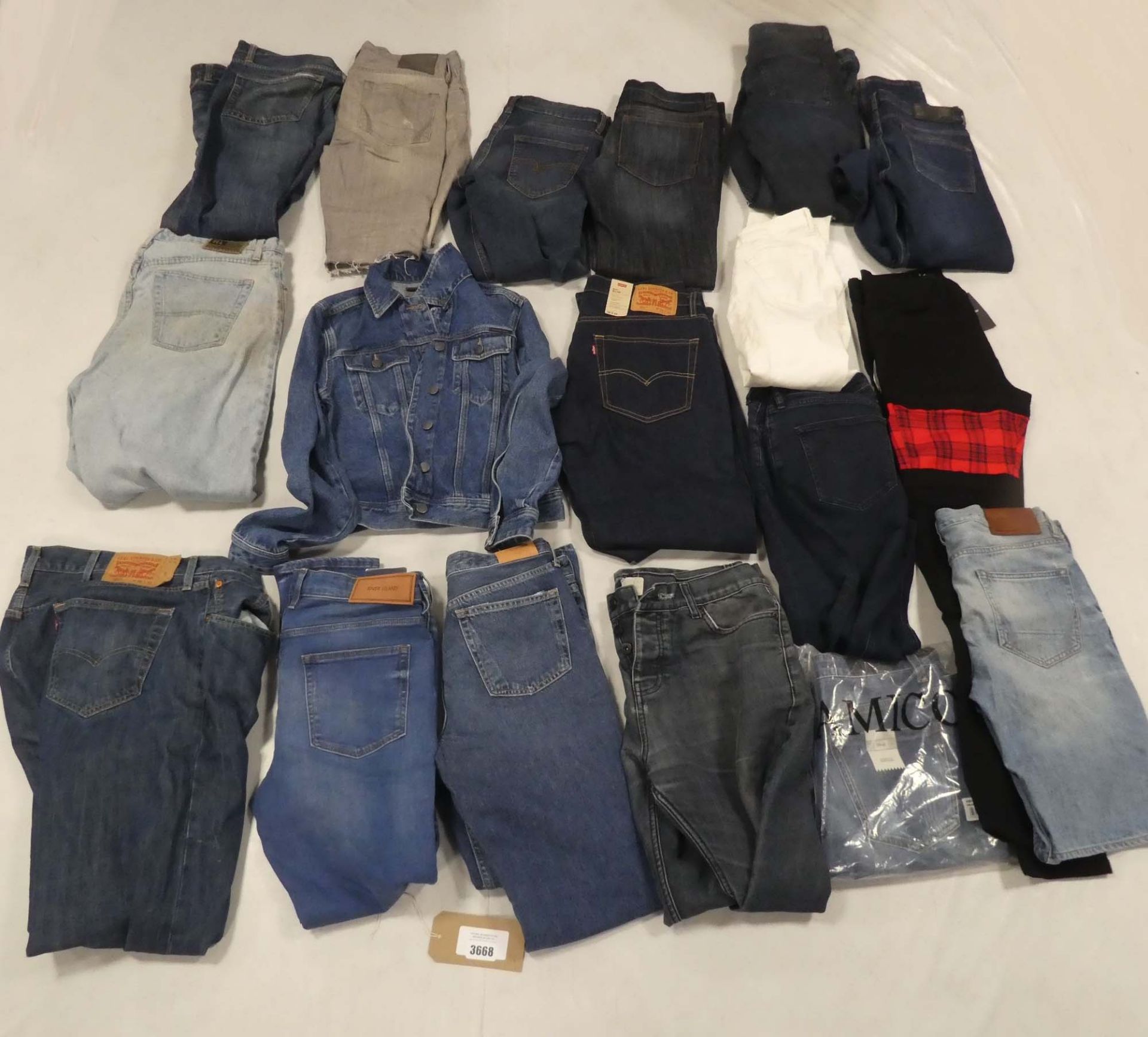 Bag containing new and used denimwear, including Levi's, River Island, Ralph Lauren, Calvin Klein,