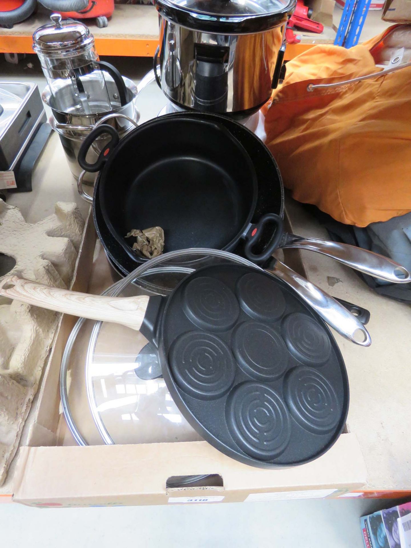 Tray containing used cooking pans