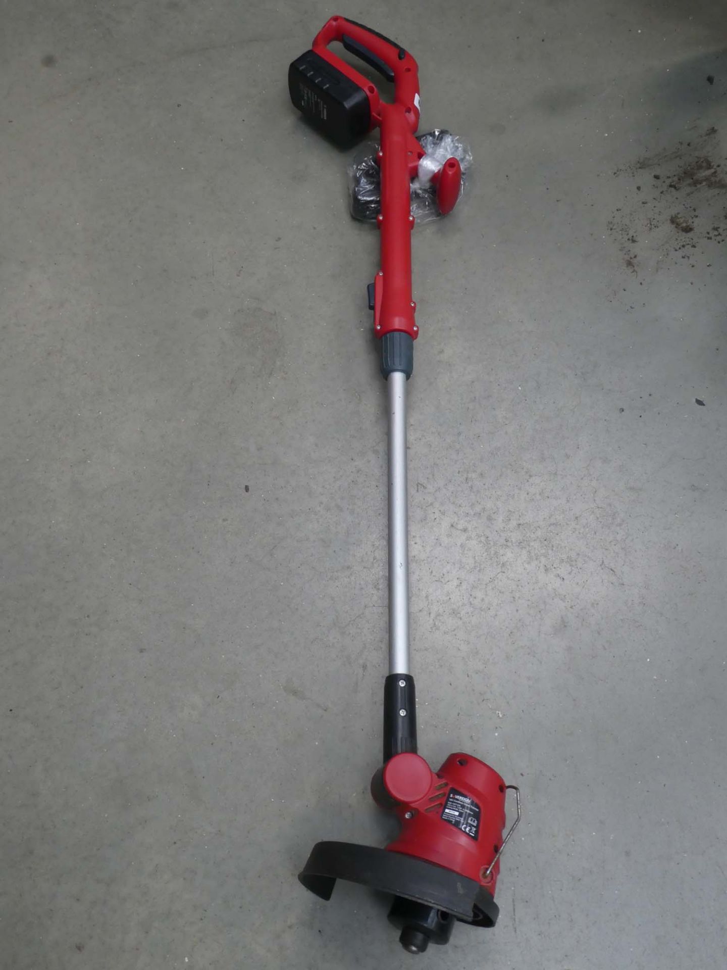 Red battery powered strimmer