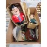 Cage containing Laurel & Hardy figures, decanter stoppers, crested ware bowl, mugs and glass ware