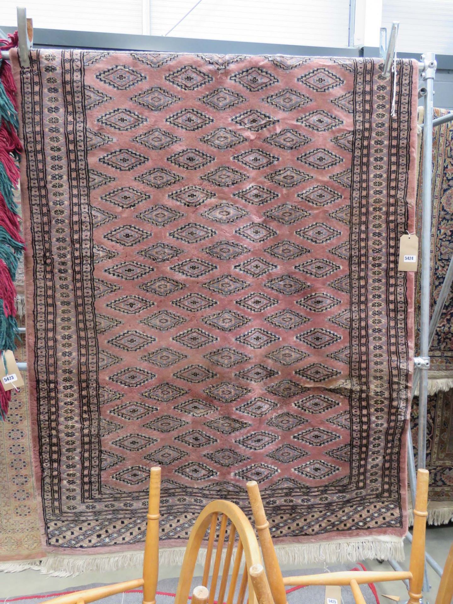 (3) Pink Pakistani mat with geometric pattern