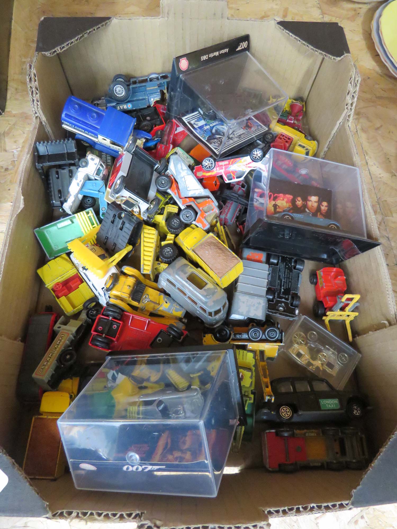 Box containing die cast cars