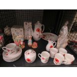 Cage containing poppy patterned Avon crockery plus Beatrix potter figures and Nao figure of lady