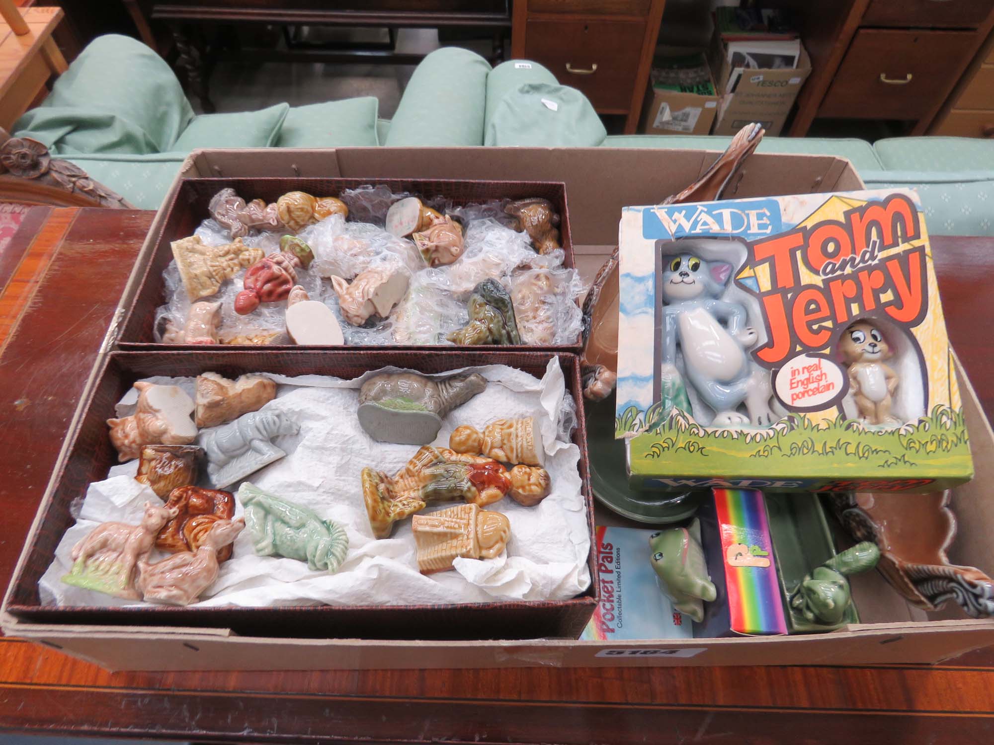 Box containing Wade Whimsies and other Wade figures