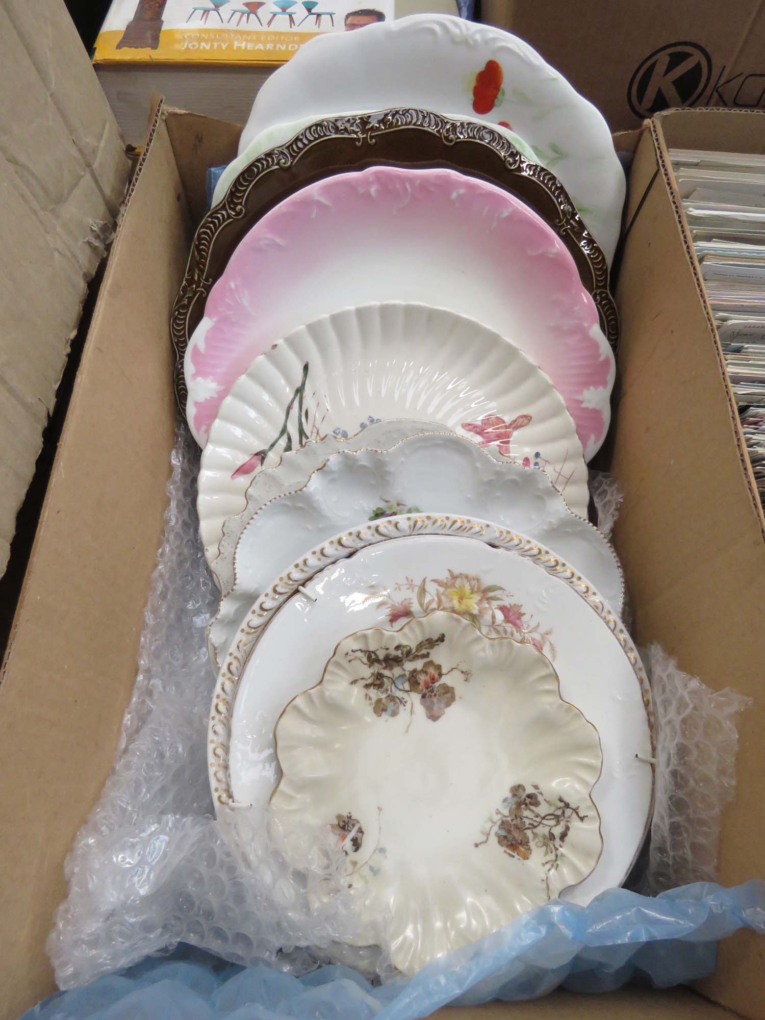 Box containing dinner plates