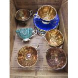 Box containing Bavarian lustre glazed coffee cups and saucers