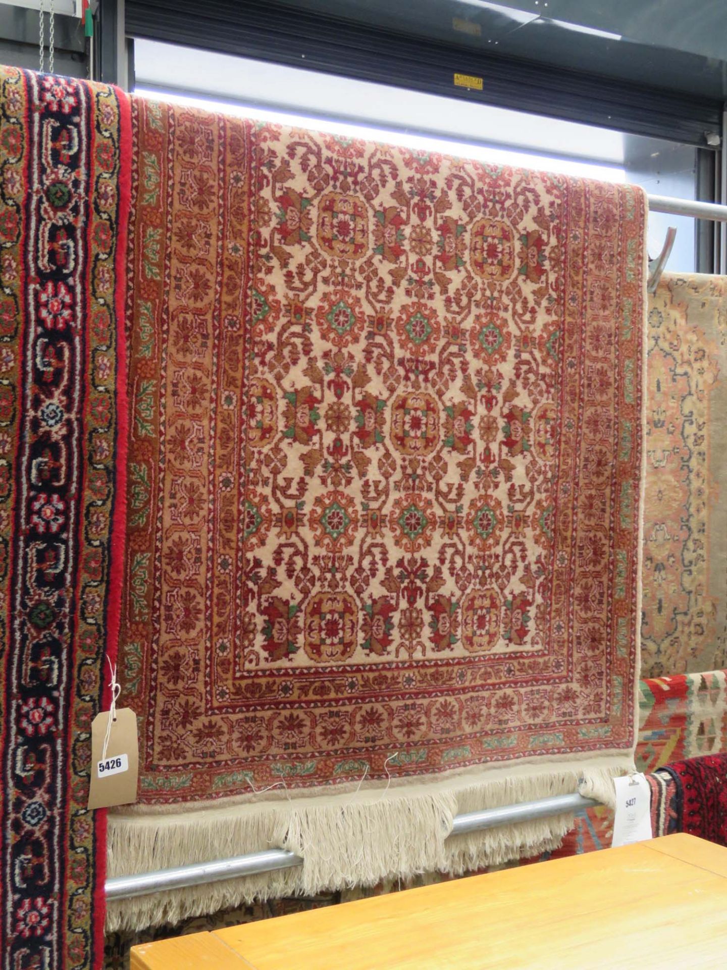 Iranian floral rug with ivory background