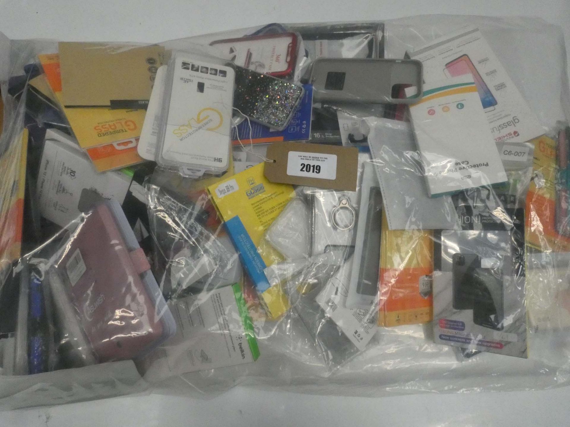 Bag containing quantity of mobile phone cases and covers