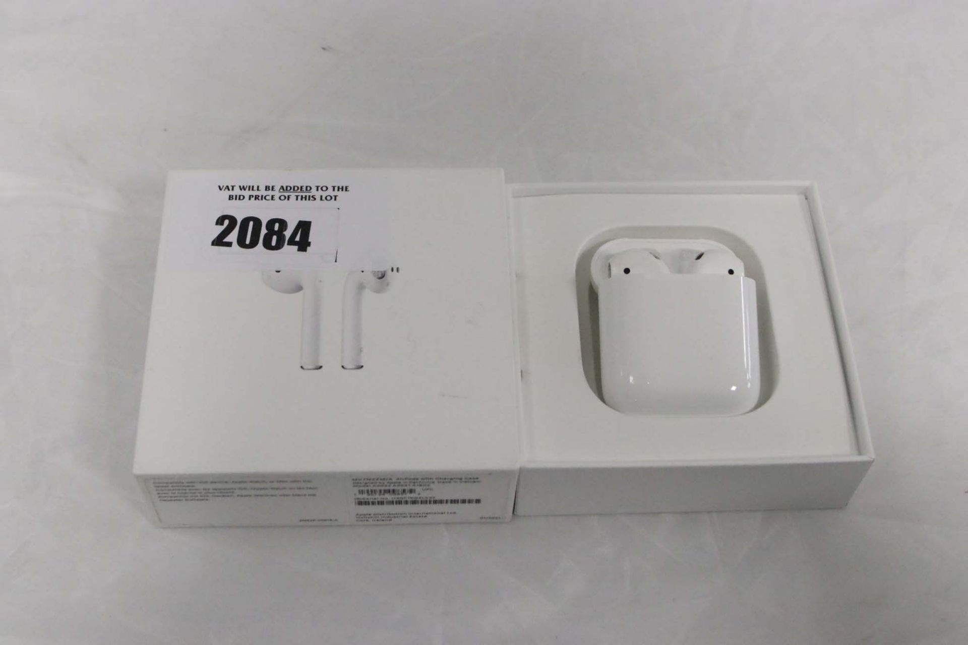 Boxed pair of Apple AirPods 1st gen with charging case