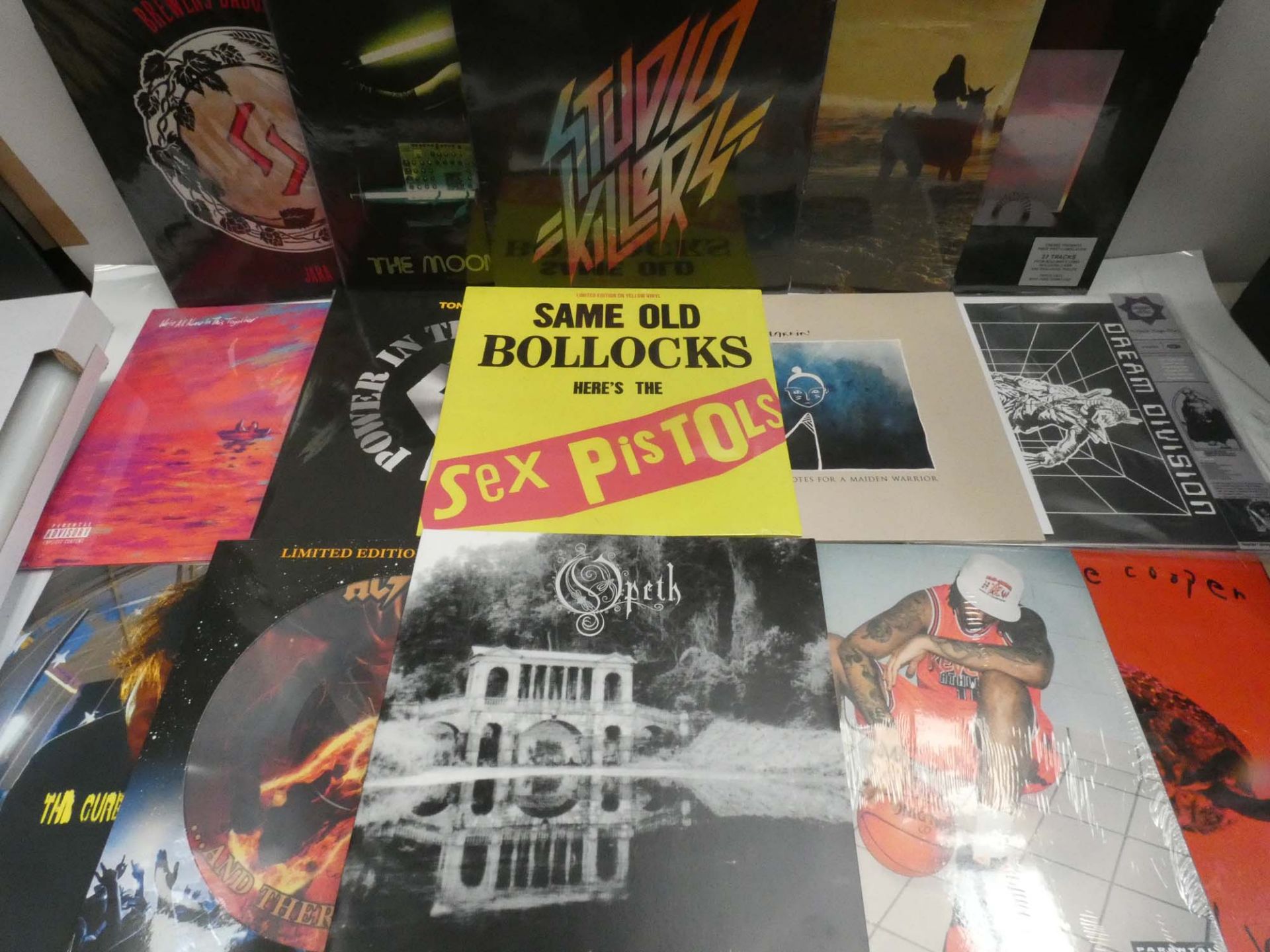 Box containing LP and 45 records to include Sex Pistols, Studio Killers, AC/DC, Dream Division and