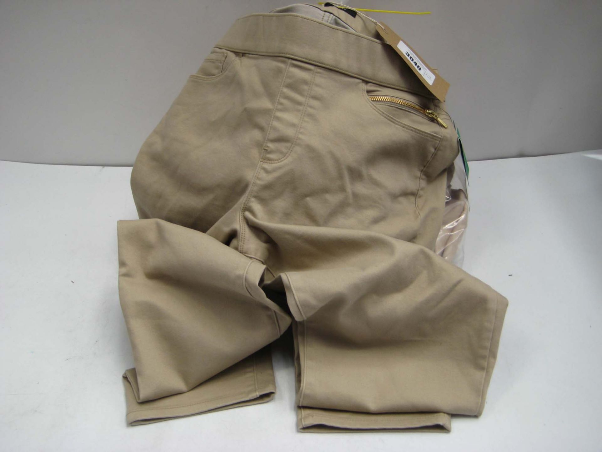 Bag containing 12 pairs of ladies trousers by Andrew Marc, sizes predominantly 18