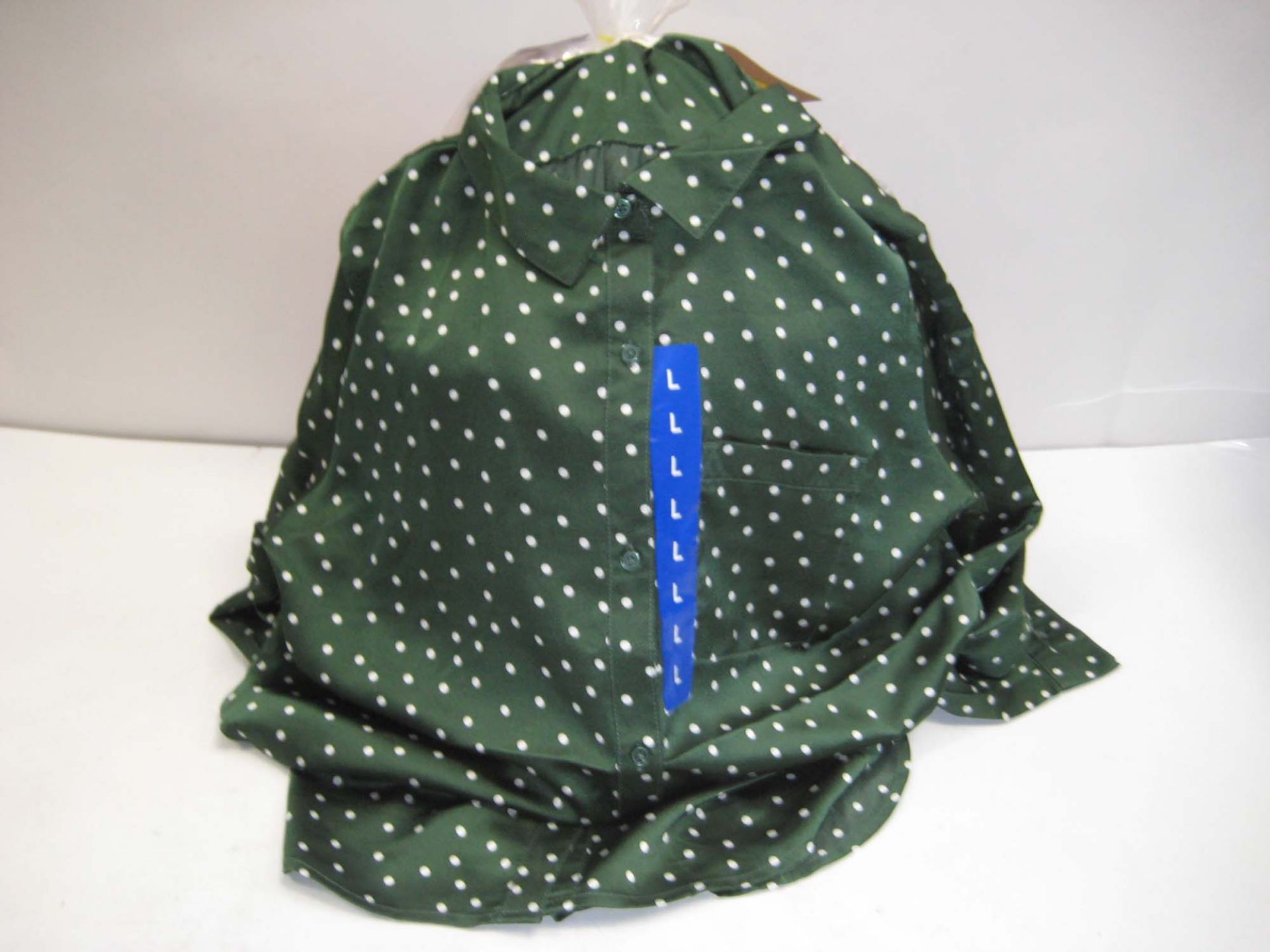 Bag containing 20 ladies polka dot tops in various sizes, colours to include predominantly pink