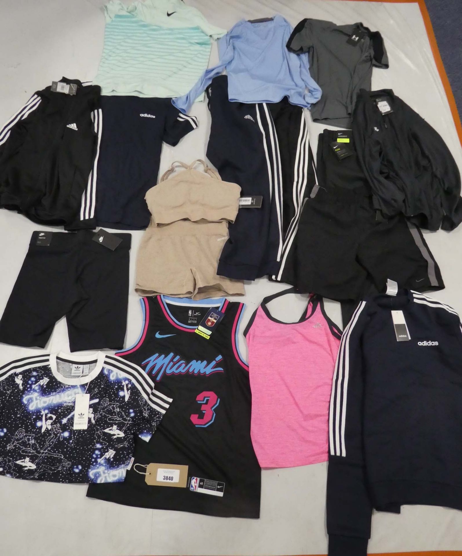 Selection of sportswear to include Nike, Adidas, Bo+Tee, etc