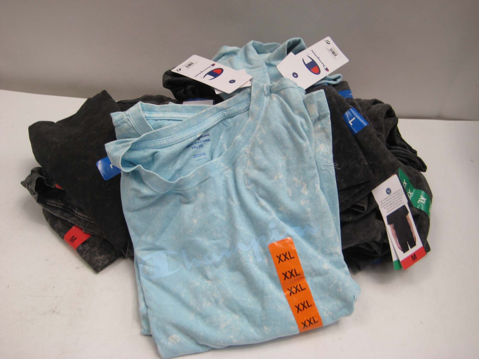 Bag containing ladies charcoal grey t-shirts by Champion sizes ranging from XXL to M (approx 20,