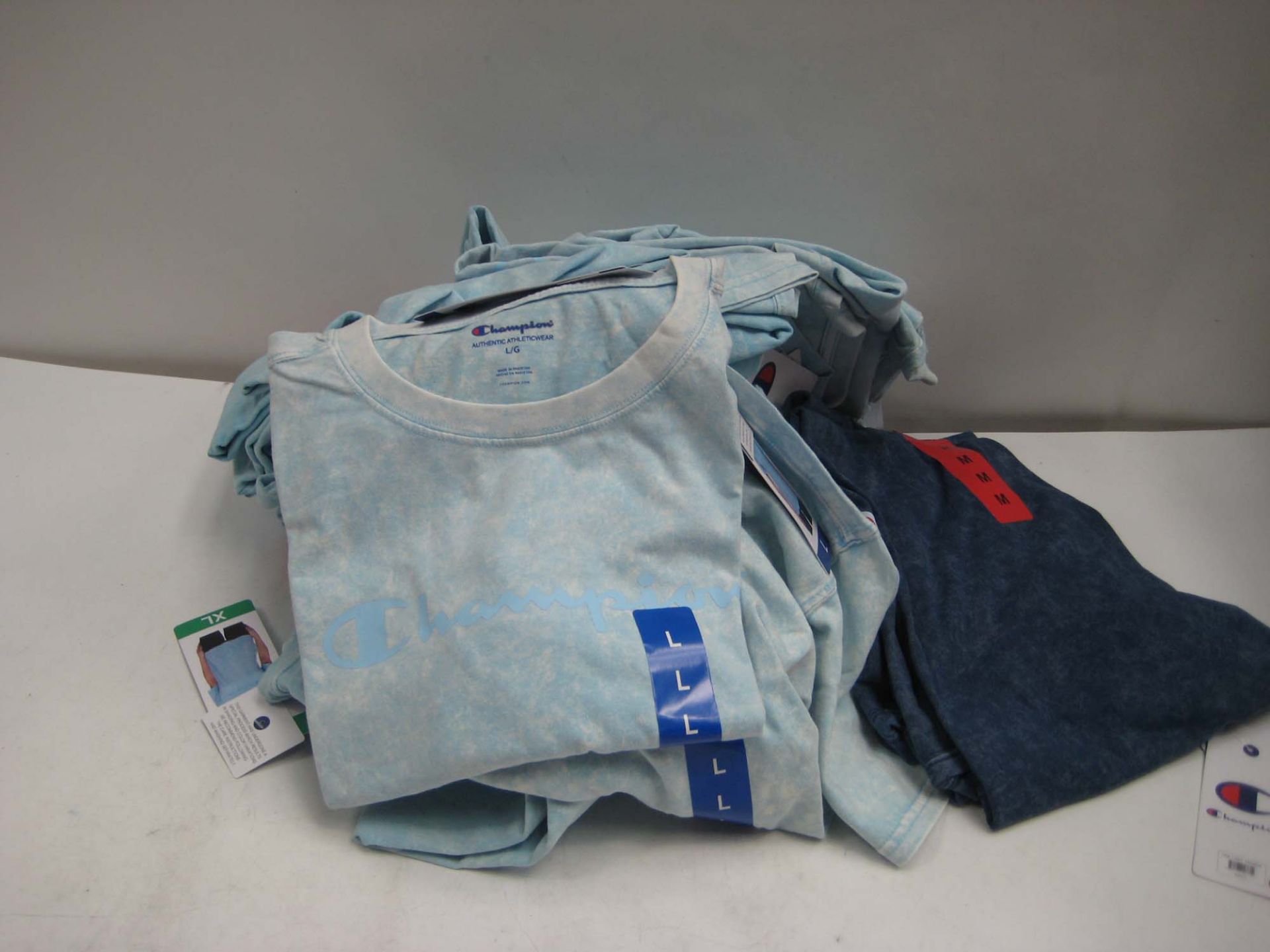 Bag containing ladies charcoal grey t-shirts by Champion sizes ranging from XXL to M (approx 20,