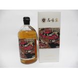 A bottle of Shinobu Pure Malt Japanse Whisky Mizunara Oak Limited Edition Red Car for The