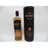 A bottle of Bushmills 10 year old Single Malt Irish Whiskey The Causeway Collection on time