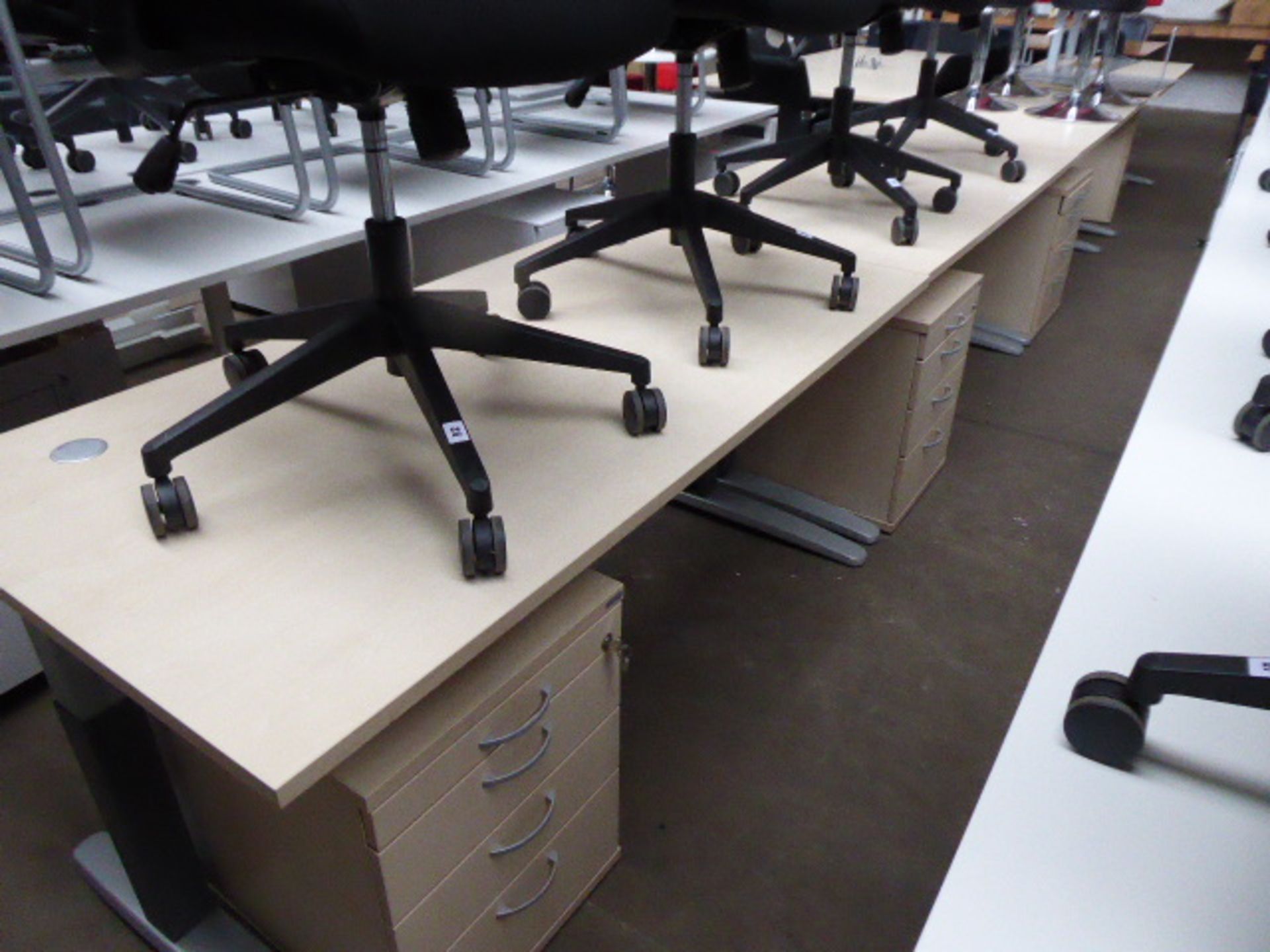 3 160cm maple effect workstations on cantilever legs each with a 4-drawer pedestal