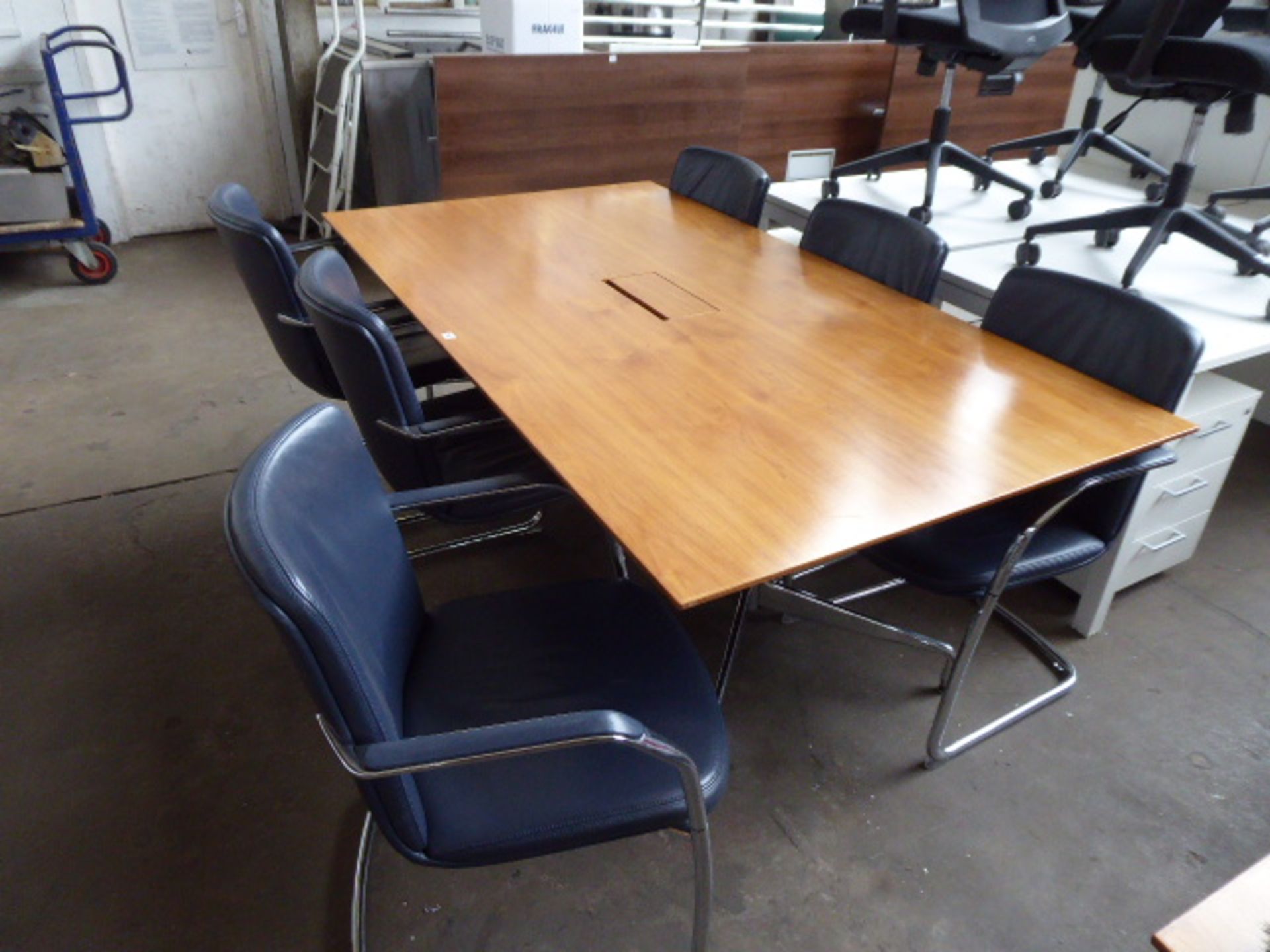 200cm x 110cm walnut effect meeting table on Charles Eames style chrome legs with set of 6 blue