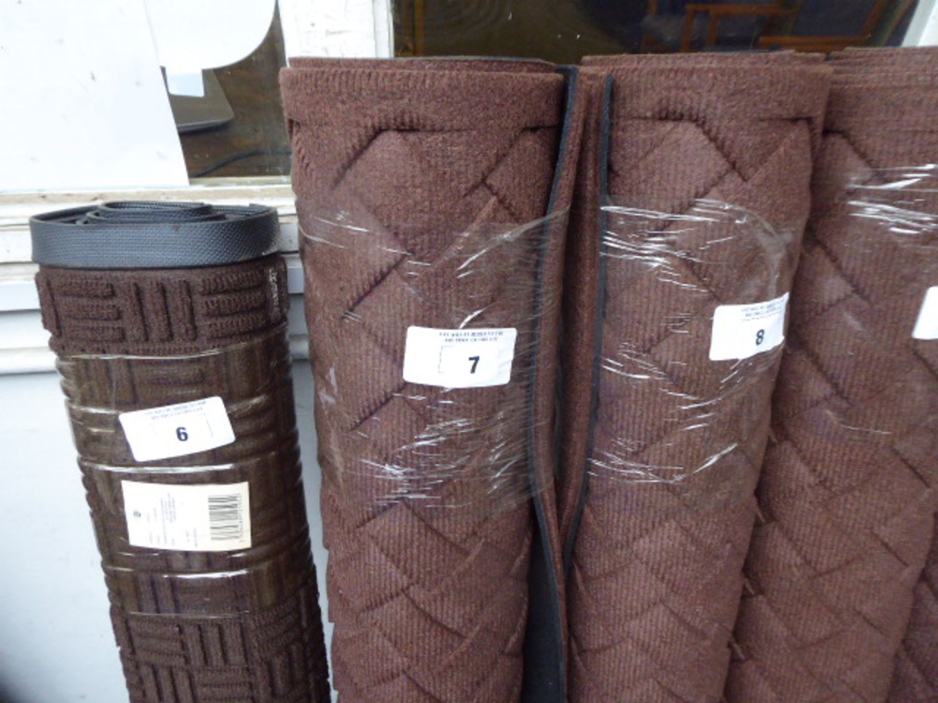 Large brown commercial mat with woven finish