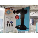 Boxed massage gun