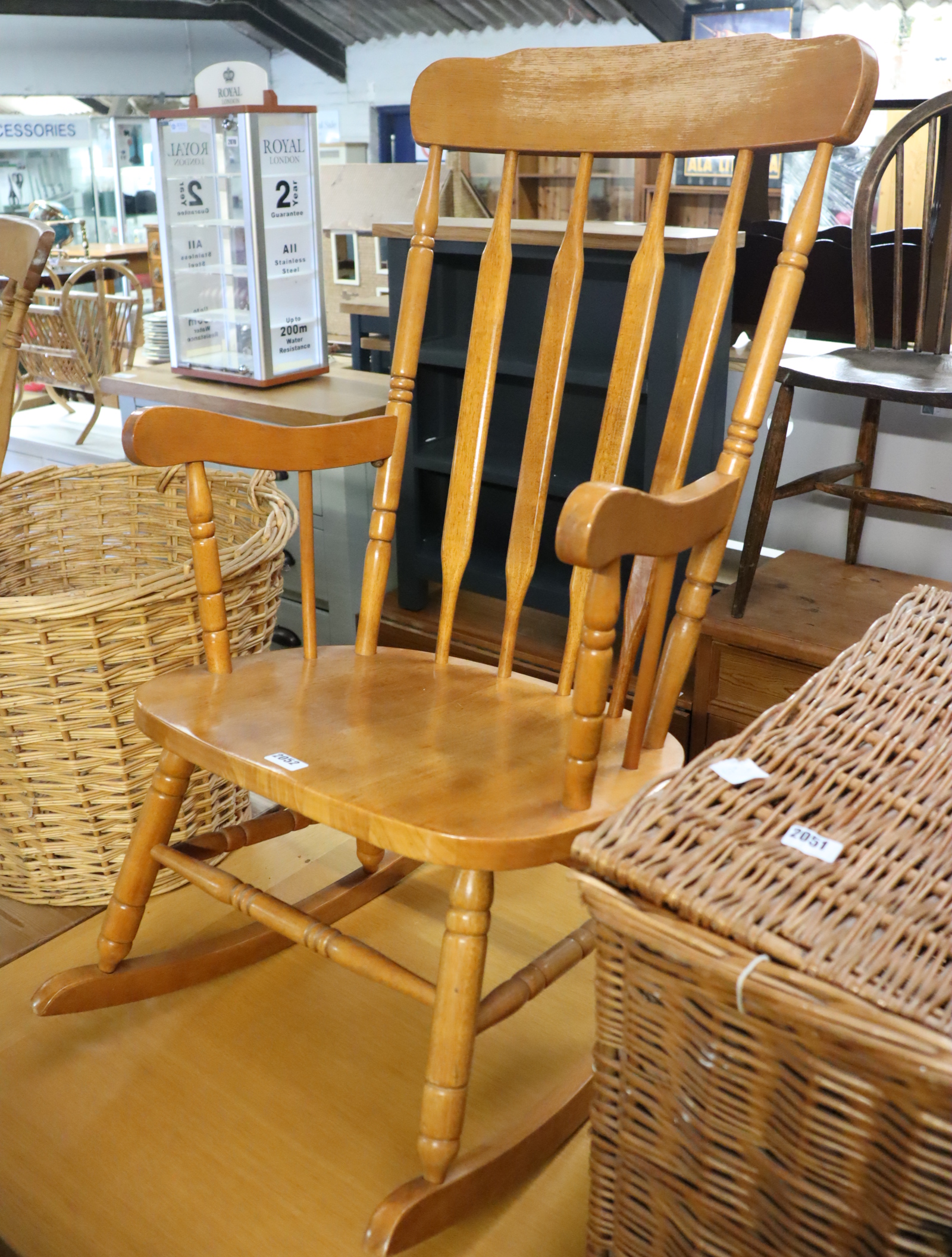 Stained beech stick back rocking chair