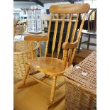 Stained beech stick back rocking chair