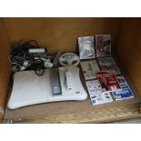 Wii Fit board and other Wii accessories and games