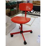Red swivel office chair