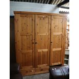 Modern pine triple door wardrobe with space for 3 drawers (only having 2)