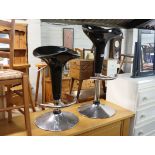 Two chrome and black finish kitchen bar stools