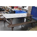 Large wooden pub bench