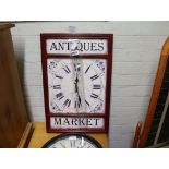 Metal framed wall clock '' Antiques Market ''