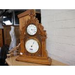 Clock / barometer in carved mahogany frame