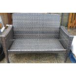 Brown rattan 2 seater sofa