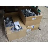 3 boxes containing Pro Elec clip on lights