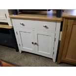 (40) Light oak and cream finish double door cupboard with single drawer