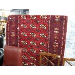 Red figured and bordered rug