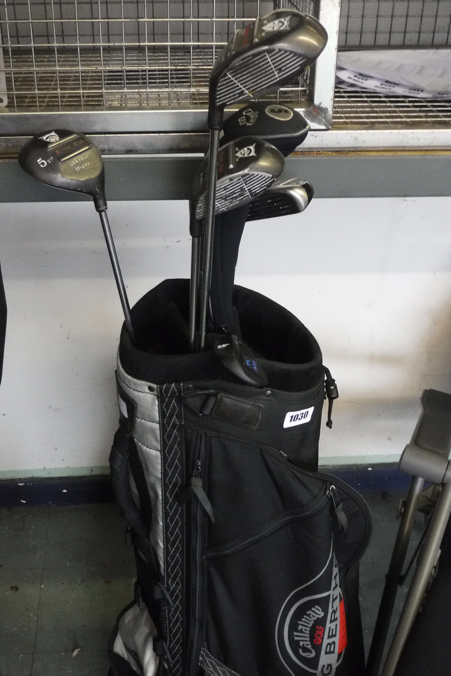 Callaway golf bag containing USA Tour golf clubs