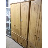 Pine effect triple door wardrobe with 5 drawers under