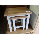 (16) Nest of two oak finish and white painted coffee tables