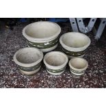 Set of 5 ceramic green painted plant pots with leaf decoration