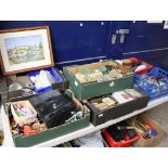 Table top of mixed household goods and ceramics incl. collectible tobacco tins, framed and glazed