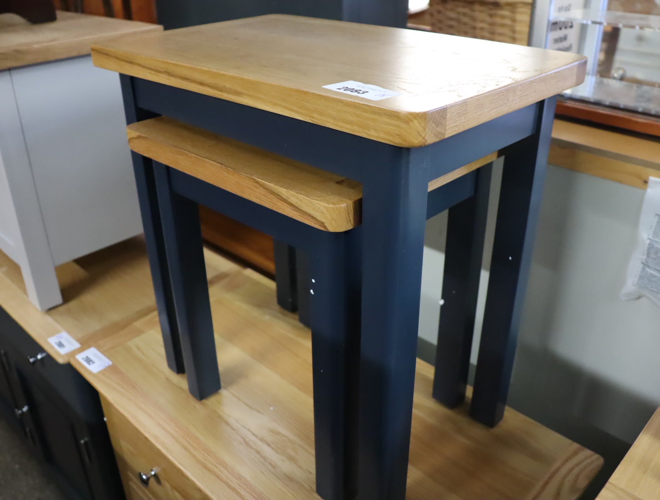 (15) NEst of 2 light oak and dark grey coffee tables