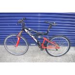 Trax mountain bike in black and red