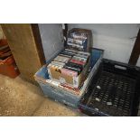 Crate containing CDs and Blu-rays