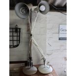 Light brown angle poise desk lamp with similar white desk lamp