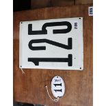 Rectangular enamelled sign; '125' with small enamelled oval plaque; '11'